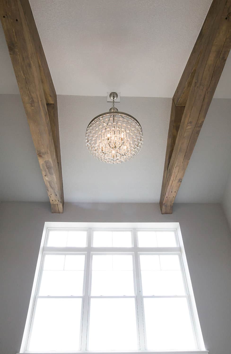 vaulted ceiling with chandelier
