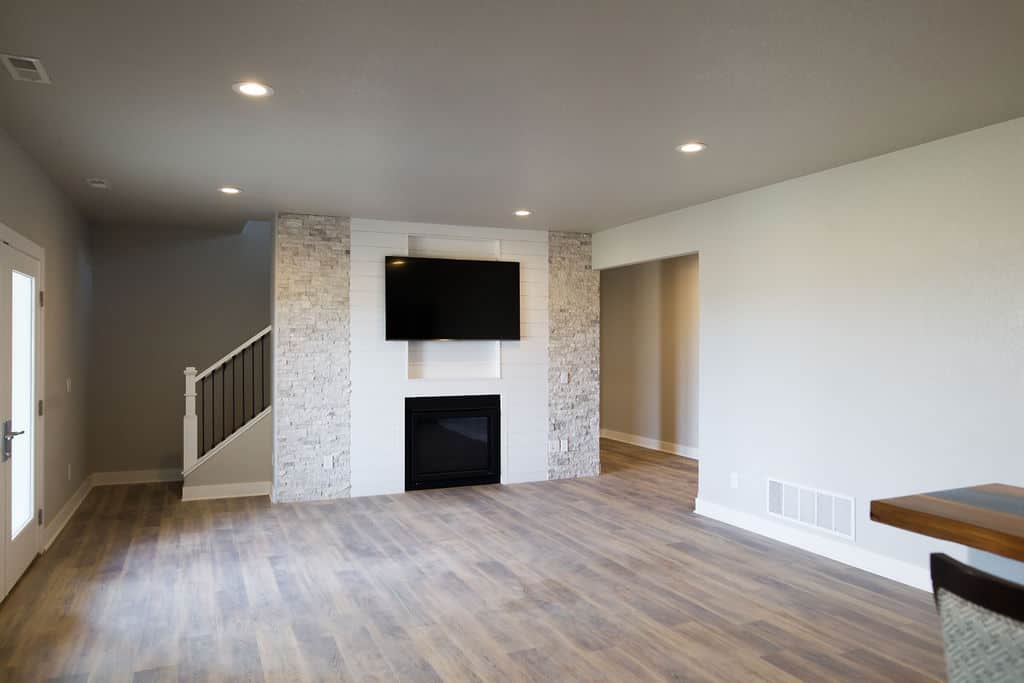 grey living room with wood floor